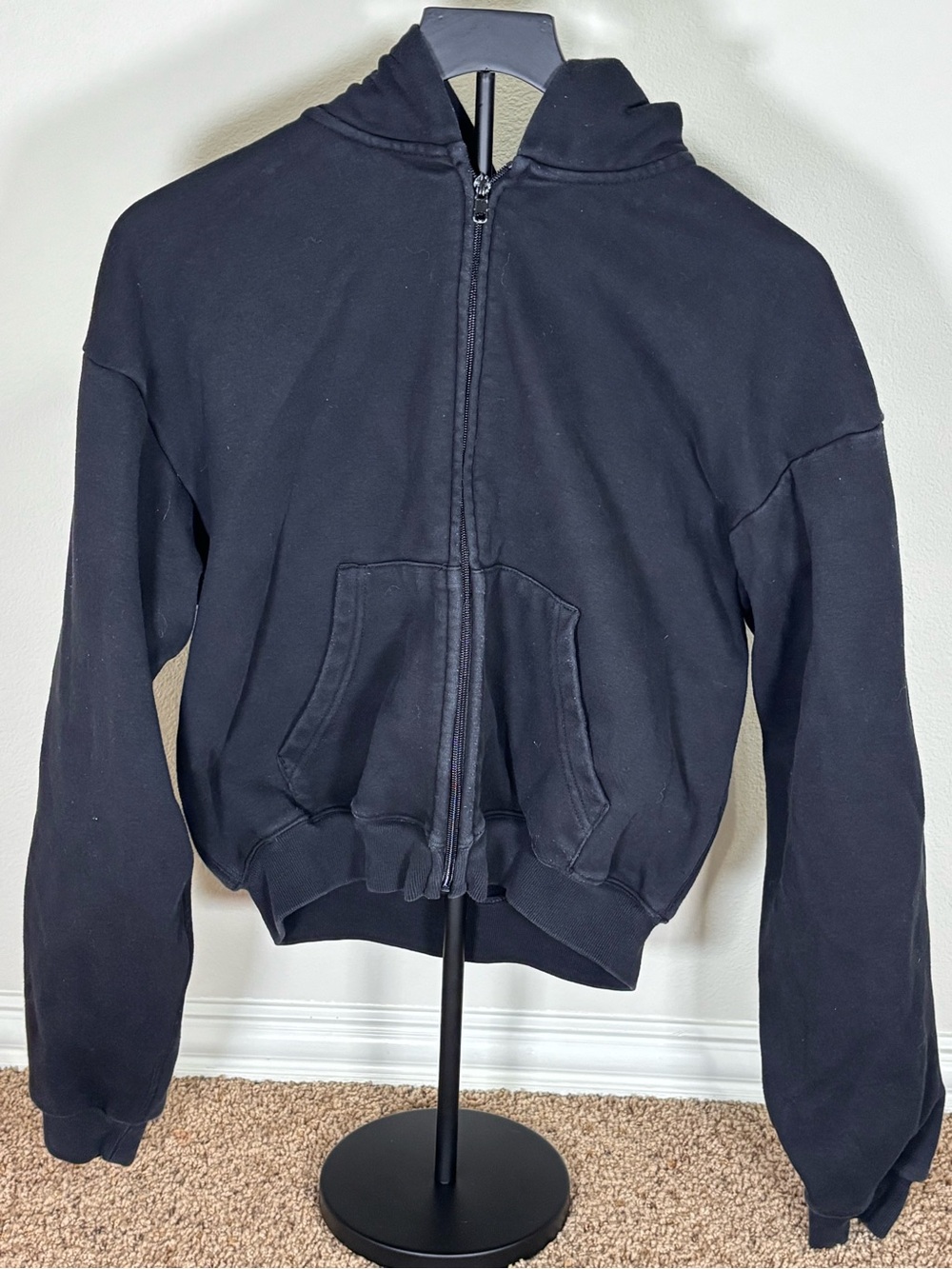 SKIMS Cotton Fleece Zip-Up Hoodie in Black, Size Medium.